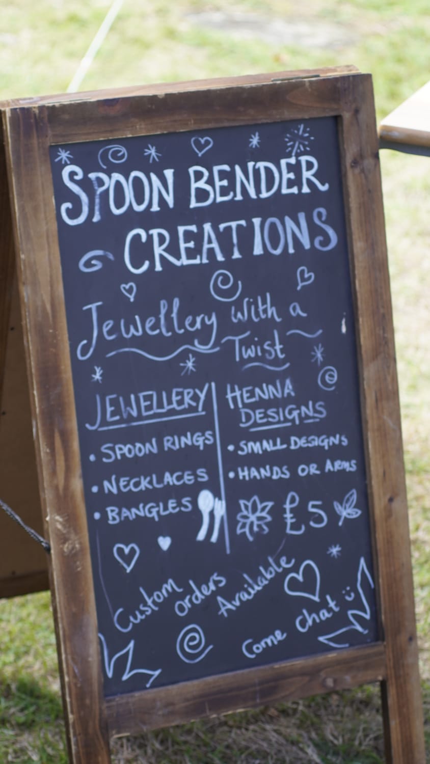 Spoon Bender Creations chalkboard sign